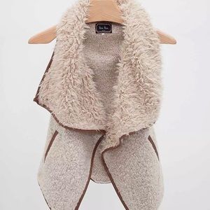 Cream colored vest. Brand is Love Tree. Size small.